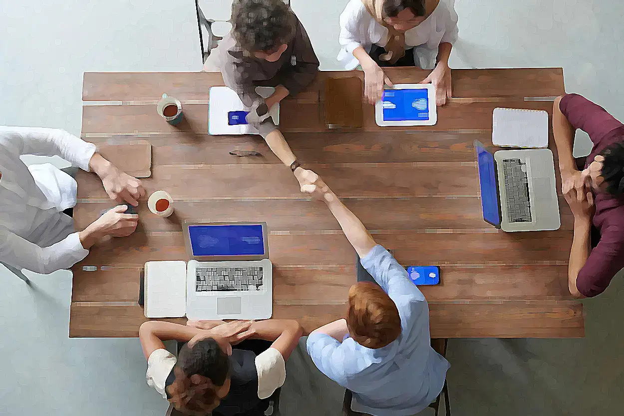 development team shaking hands